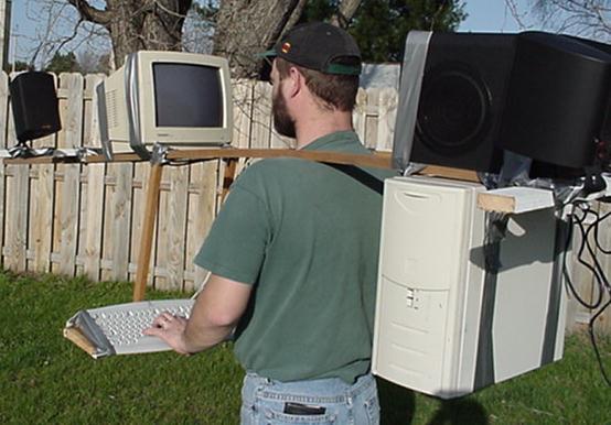 The first portable computer, modeled by some guy who isn't me.